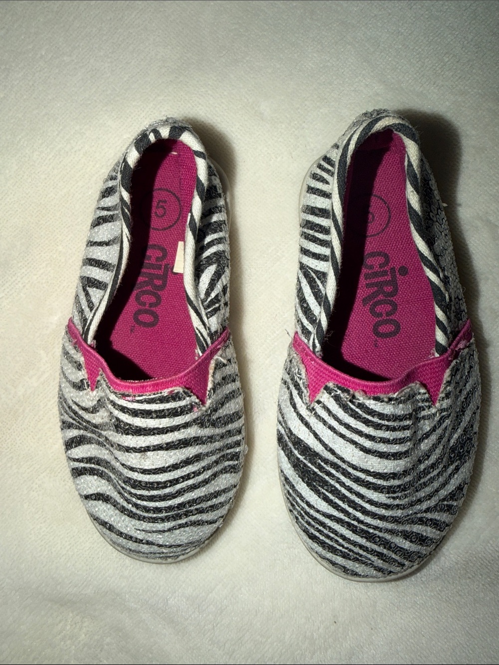 Circo Girls Zebra Slip-On Sneakers in Black, White & Pink